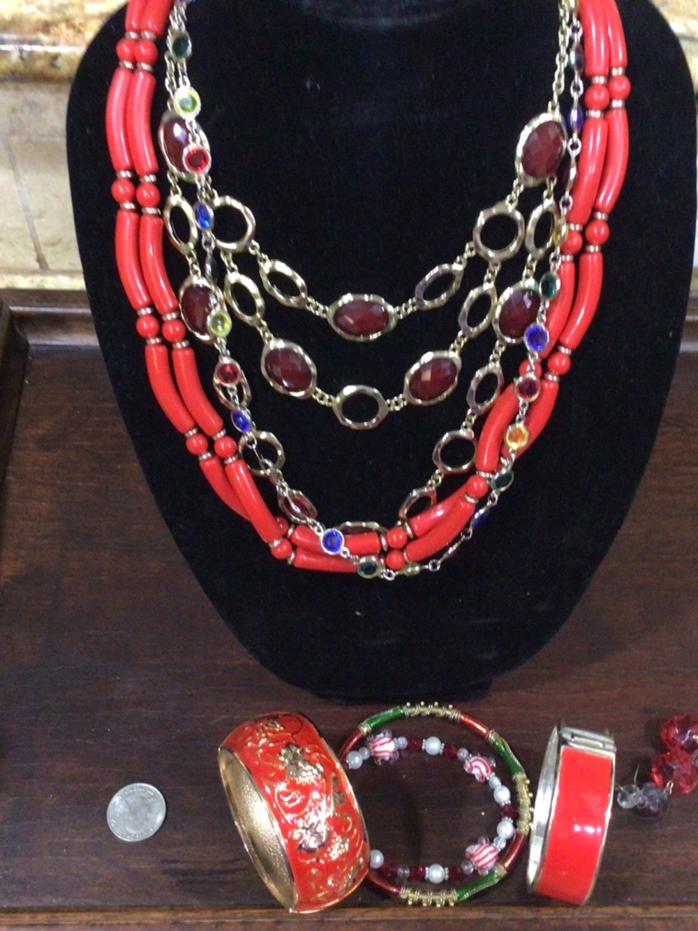 Tray of miscellaneous jewelry. 3 necklaces, 4 bracelets, one pair of earrings